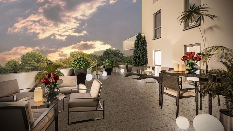investisseur immobilier locatif-terrasse salon de jardin transat lampes allumés plantes ciel sombre